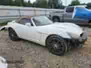 2008 Saturn Sky Red Line with VIN 1G8MF35X48Y119653, listed as a Copart auction lot 63591595 with 140,643 mi miles and Clean title. Bid and sale history available at DreamBid. Image 4.