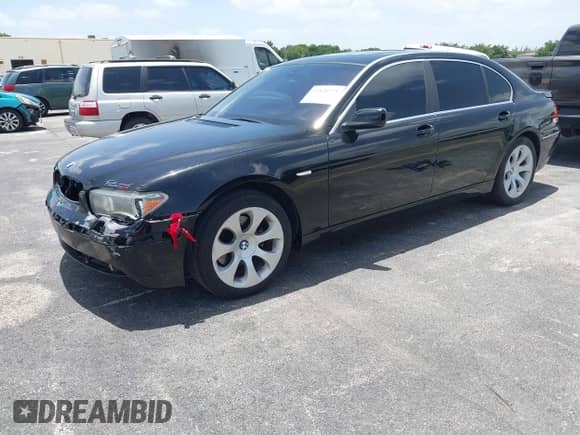 2004 BMW 7 Series 745Li with VIN WBAGN63494DS46767, listed as a IAAI auction lot 42838773 with 185,396 mi miles and . Bid and sale history available at DreamBid. Image 2.