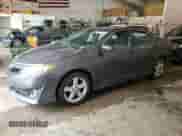 2014 Toyota Camry L with VIN 4T1BF1FK0EU750239, listed as a Copart auction lot 65790025 with 142,033 mi miles and Salvage title. Bid and sale history available at DreamBid. Image 1.