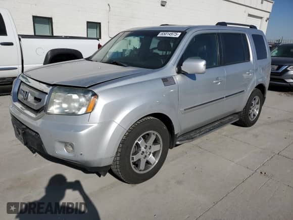 2009 Honda Pilot Touring с VIN 5FNYF48929B048741, выставлен на аукционе Copart как лот 65014975 с пробегом 131 273 миль миль и Списание • Salvage title. История ставок и продаж доступна на DreamBid. Изображение 1.