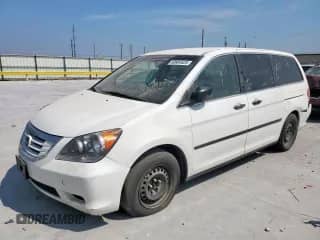 2009 Honda Odyssey LX с VIN 5FNRL38209B036047, выставлен на аукционе Copart как лот 80884425 с пробегом 205 546 миль миль и Чистый • Clean title. История ставок и продаж доступна на DreamBid. Изображение 1.