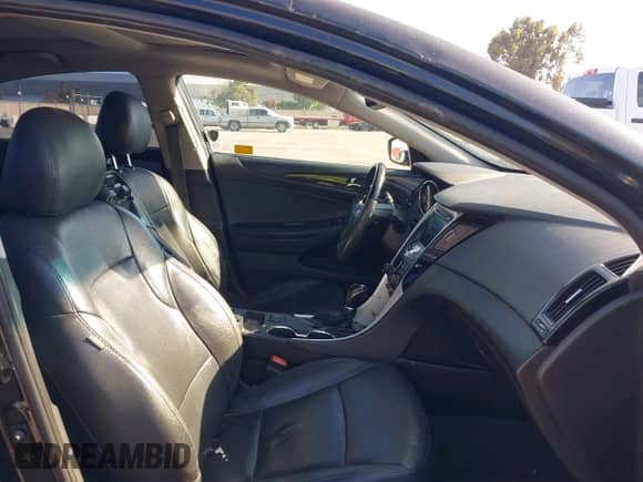 2013 Hyundai Sonata SE with VIN 5NPEC4AC2DH670705, listed as a IAAI auction lot 43283130 with 151,485 mi miles and . Bid and sale history available at DreamBid. Image 5.