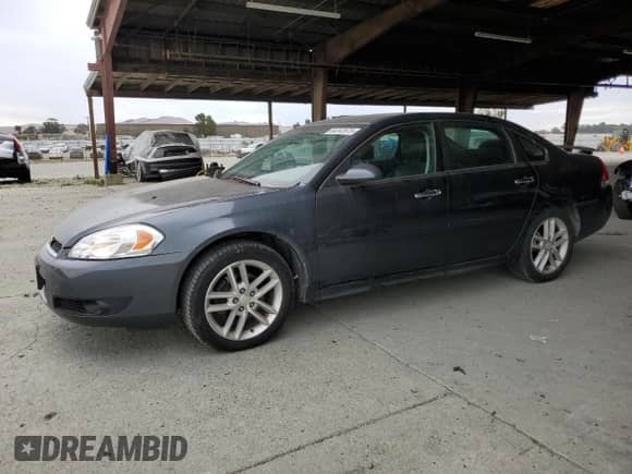 2013 Chevrolet Impala LTZ with VIN 2G1WC5E31D1196700, listed as a Copart auction lot 84242875 with 142,252 mi miles and Clean title. Bid and sale history available at DreamBid. Image 1.
