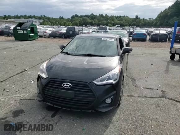 2013 Hyundai Veloster Turbo с VIN KMHTC6AE4DU171846, выставлен на аукционе Copart как лот 69561135 с пробегом Не указан миль и На запчасти • Non repairable. История ставок и продаж доступна на DreamBid. Изображение 13.