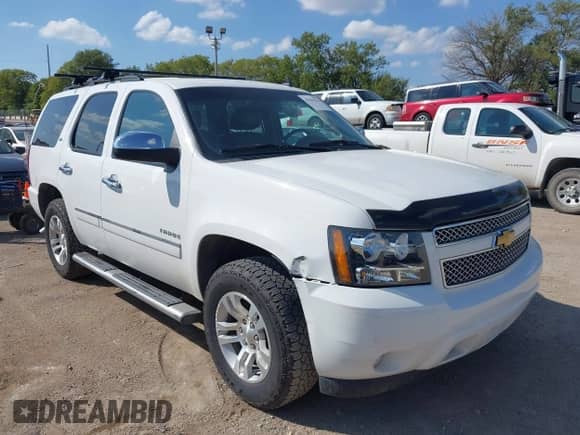 2013 Chevrolet Tahoe LTZ z VIN 1GNSKCE05DR246189, wystawiony jako IAAI lot #43204323 z przebiegiem 183 287 mil mil oraz . Historia ofert i sprzedaży dostępna na DreamBid. Obrazek 1.