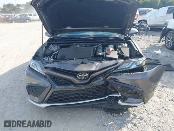 2023 Toyota Camry TRD with VIN 4T1KZ1AK1PU083876, listed as a IAAI auction lot 43378622 with 18,787 mi miles and . Bid and sale history available at DreamBid. Image 6.