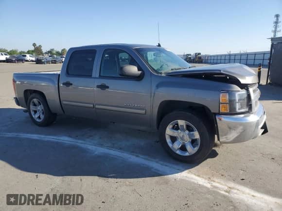 2012 Chevrolet Silverado 1500 LS z VIN 3GCPCREA6CG309922, wystawiony jako Copart lot #54973085 z przebiegiem 222 371 mil mil oraz Szkoda całkowita • Salvage title. Historia ofert i sprzedaży dostępna na DreamBid. Obrazek 4.