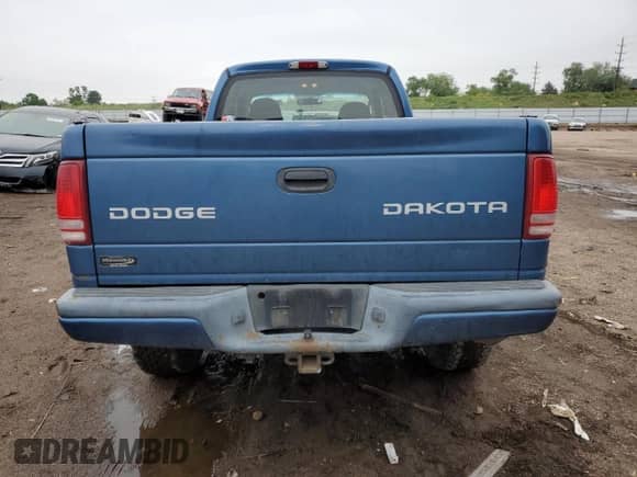 2004 Dodge Dakota Sport with VIN 1D7HG32N94S729963, listed as a Copart auction lot 59885725 with 157,911 mi miles and Salvage title. Bid and sale history available at DreamBid. Image 6.