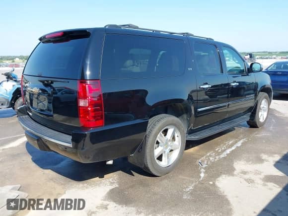 2013 Chevrolet Suburban LTZ с VIN 1GNSKKE73DR259207, выставлен на аукционе IAAI как лот 42938763 с пробегом 91 393 миль миль и . История ставок и продаж доступна на DreamBid. Изображение 4.
