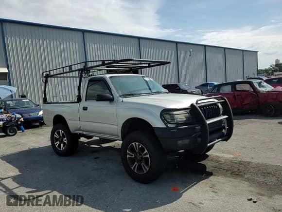 2004 Toyota Tacoma PreRunner z VIN 5TENM92NX4Z399660, wystawiony jako Copart lot #80953515 z przebiegiem 265 626 mil mil oraz Szkoda całkowita • Salvage title. Historia ofert i sprzedaży dostępna na DreamBid. Obrazek 13.