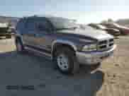 2003 Dodge Durango SLT Plus with VIN 1D4HS58NX3F518678, listed as a Copart auction lot 56075525 with 140,709 mi miles and Salvage title. Bid and sale history available at DreamBid. Image 4.