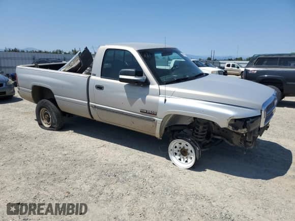 2000 Dodge 2500 with VIN 3B7KF2665YM215073, listed as a Copart auction lot 59399015 with 264,074 mi miles and Salvage title. Bid and sale history available at DreamBid. Image 4.