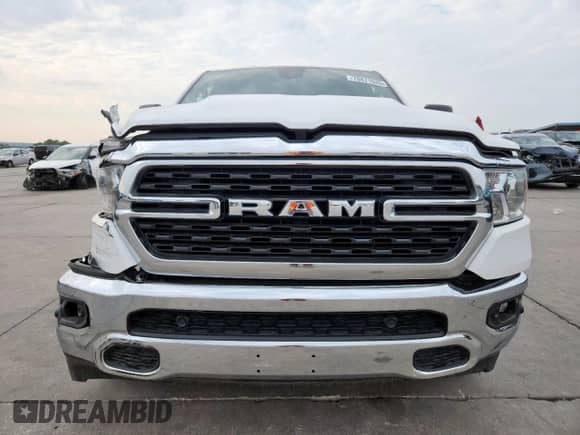 2023 Ram 1500 Lone Star with VIN 1C6SRFFT4PN698815, listed as a Copart auction lot 70471535 with 33,439 mi miles and Salvage title. Bid and sale history available at DreamBid. Image 5.