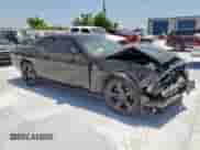 2014 Dodge Challenger R/T Plus with VIN 2C3CDYBT0EH122467, listed as a Copart auction lot 58392365 with 136,793 mi miles and Salvage title. Bid and sale history available at DreamBid. Image 4.