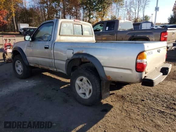 2001 Toyota Tacoma with VIN 5TEPM62N91Z780824, listed as a Copart auction lot 90220975 with 211,375 mi miles and Clean title. Bid and sale history available at DreamBid. Image 2.