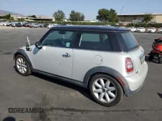 2013 MINI Hardtop with VIN WMWSU3C58DT371379, listed as a Copart auction lot 59606005 with 59,901 mi miles and Salvage title. Bid and sale history available at DreamBid. Image 2.