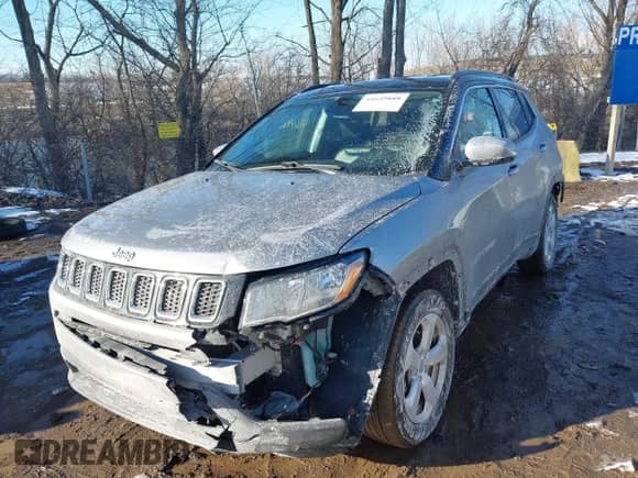 2018 Jeep Compass Latitude with VIN 3C4NJDBB2JT434143, listed as a IAAI auction lot 41649888 with 90,722 mi miles and . Bid and sale history available at DreamBid. Image 2.
