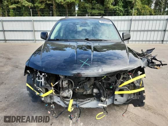 2020 Dodge Journey Crossroad с VIN 3C4PDCGBXLT271537, выставлен на аукционе Copart как лот 83854495 с пробегом 106 749 миль миль и Списание • Salvage title. История ставок и продаж доступна на DreamBid. Изображение 5.