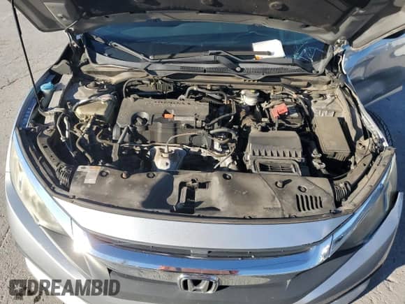 2016 Honda Civic LX с VIN 19XFC2F5XGE021374, выставлен на аукционе Copart как лот 89573625 с пробегом 88 441 миль миль и Списание • Salvage title. История ставок и продаж доступна на DreamBid. Изображение 11.