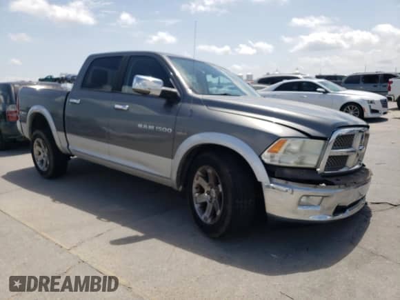 2012 Ram 1500 Laramie z VIN 1C6RD6NT9CS292359, wystawiony jako Copart lot #57152145 z przebiegiem 166 268 mil mil oraz Szkoda całkowita • Salvage title. Historia ofert i sprzedaży dostępna na DreamBid. Obrazek 4.