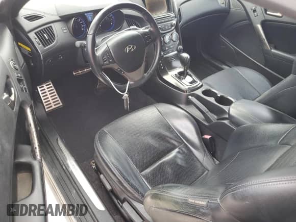 2013 Hyundai Genesis Coupe R-Spec с VIN KMHHU6KJ9DU088413, выставлен на аукционе Copart как лот 81117304 с пробегом 184 966 миль миль и Списание • Salvage title. История ставок и продаж доступна на DreamBid. Изображение 8.