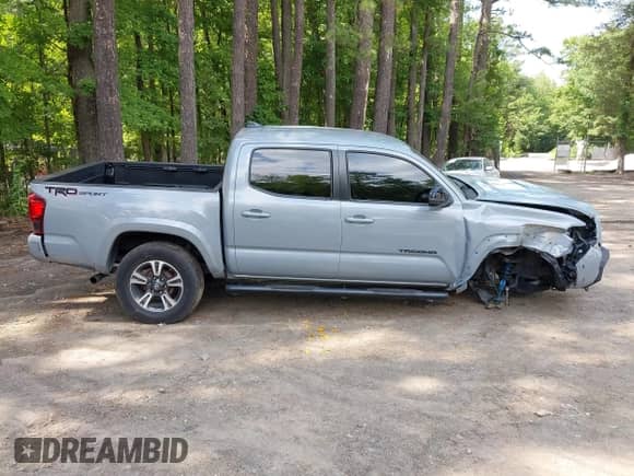 2019 Toyota Tacoma SR5 z VIN 3TMAZ5CN1KM113843, wystawiony jako IAAI lot #42716836 z przebiegiem 43 164 mil mil oraz . Historia ofert i sprzedaży dostępna na DreamBid. Obrazek 13.