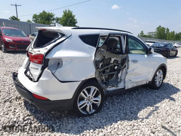 2014 Hyundai Santa Fe с VIN 5XYZU3LA2EG160691, выставлен на аукционе Copart как лот 64519545 с пробегом Не указан миль и Чистый • Clean title. История ставок и продаж доступна на DreamBid. Изображение 3.