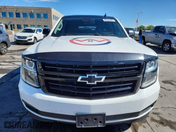 2018 Chevrolet Suburban Premier with VIN 1GNSKJKC5JR353659, listed as a Copart auction lot 80508345 with 77,320 mi miles and Salvage title. Bid and sale history available at DreamBid. Image 5.