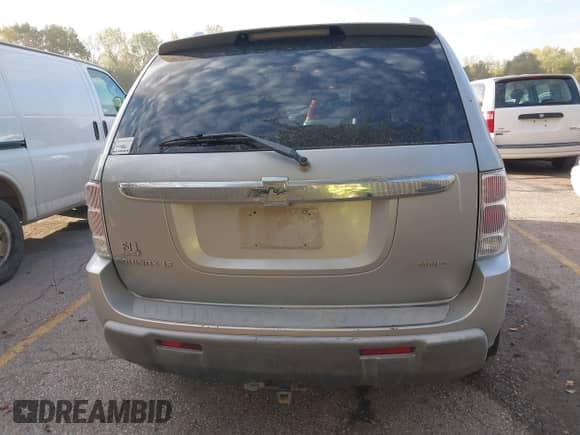 2005 Chevrolet Equinox LT z VIN 2CNDL73F856071202, wystawiony jako IAAI lot #43441558 z przebiegiem 123 909 mil mil oraz . Historia ofert i sprzedaży dostępna na DreamBid. Obrazek 6.