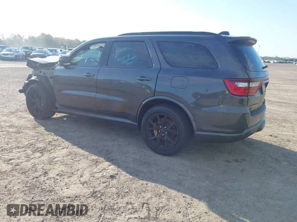 2024 Dodge Durango SRT 392 Plus with VIN 1C4SDJGJ4RC219086, listed as a IAAI auction lot 43297195 with 14,112 mi miles and . Bid and sale history available at DreamBid. Image 3.