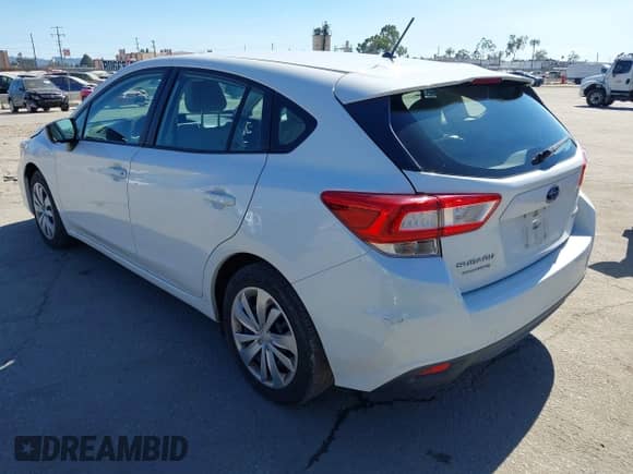 2019 Subaru Impreza with VIN 4S3GTAA64K3726251, listed as a IAAI auction lot 42790276 with 30,890 mi miles and . Bid and sale history available at DreamBid. Image 3.