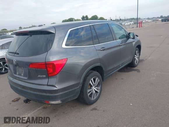 2018 Honda Pilot EX with VIN 5FNYF6H33JB044757, listed as a IAAI auction lot 43262855 with 106,702 mi miles and . Bid and sale history available at DreamBid. Image 4.