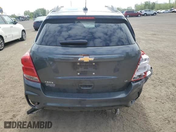 2018 Chevrolet Trax LT with VIN 3GNCJLSB0JL148140, listed as a Copart auction lot 69277385 with 58,268 mi miles and Salvage title. Bid and sale history available at DreamBid. Image 6.