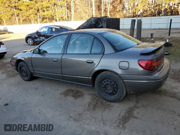2000 Saturn SL with VIN 1G8ZJ5274YZ256204, listed as a Copart auction lot 79502124 with 190,120 mi miles and Salvage title. Bid and sale history available at DreamBid. Image 2.