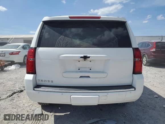 2016 Chevrolet Tahoe LTZ with VIN 1GNSCCKC4GR473440, listed as a Copart auction lot 70414425 with 158,224 mi miles and Salvage title. Bid and sale history available at DreamBid. Image 6.
