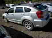 2010 Dodge Caliber Mainstreet with VIN 1B3CB3HA2AD615313, listed as a Copart auction lot 87078025 with 157,176 mi miles and Salvage title. Bid and sale history available at DreamBid. Image 2.