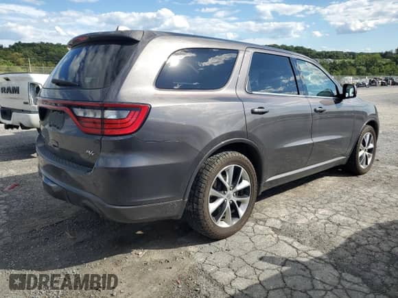 2014 Dodge Durango R/T with VIN 1C4SDJCT0EC978982, listed as a Copart auction lot 70347785 with 136,373 mi miles and Salvage title. Bid and sale history available at DreamBid. Image 3.