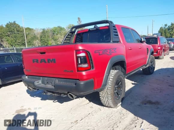 2021 Ram 1500 TRX with VIN 1C6SRFU97MN804225, listed as a IAAI auction lot 40693168 with 13,221 mi miles and . Bid and sale history available at DreamBid. Image 4.