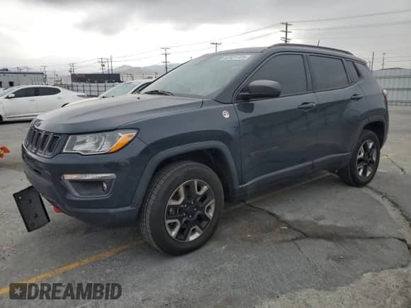 2017 Jeep Compass Trailhawk with VIN 3C4NJDDB0HT659636, listed as a Copart auction lot 62021725 with 34,092 mi miles and Salvage title. Bid and sale history available at DreamBid. Image 1.