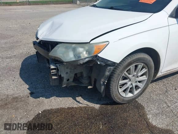 2012 Toyota Camry L z VIN 4T1BF1FK2CU630231, wystawiony jako IAAI lot #43021349 z przebiegiem 138 845 mil mil oraz . Historia ofert i sprzedaży dostępna na DreamBid. Obrazek 6.