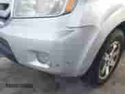 2009 Honda Pilot Touring with VIN 5FNYF38839B022943, listed as a IAAI auction lot 42443006 with 199,184 mi miles and . Bid and sale history available at DreamBid. Image 6.