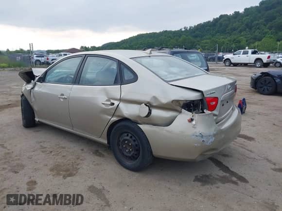 2009 Hyundai Elantra SE z VIN KMHDU46D99U662300, wystawiony jako IAAI lot #42839675 z przebiegiem 118 975 mil mil oraz . Historia ofert i sprzedaży dostępna na DreamBid. Obrazek 3.