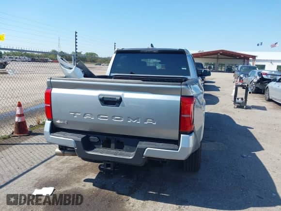 2024 Toyota Tacoma TRD Off Road with VIN 3TMLB5JN8RM010395, listed as a IAAI auction lot 43375716 with 20,319 mi miles and . Bid and sale history available at DreamBid. Image 17.