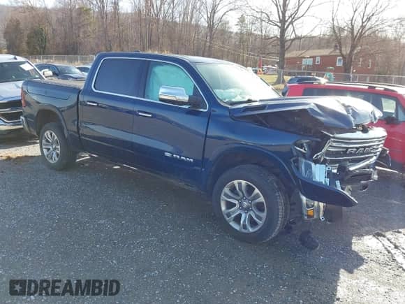 2020 Ram 1500 Longhorn with VIN 1C6SRFKT5LN185329, listed as a IAAI auction lot 41709711 with 78,586 mi miles and . Bid and sale history available at DreamBid. Image 1.