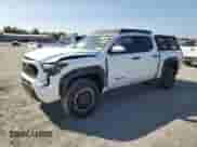2024 Toyota Tacoma SR5 with VIN 3TMLB5JN4RM050957, listed as a Copart auction lot 71130595 with 1,873 mi miles and Salvage title. Bid and sale history available at DreamBid. Image 1.