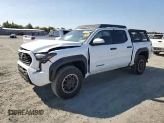 2024 Toyota Tacoma SR5 with VIN 3TMLB5JN4RM050957, listed as a Copart auction lot 71130595 with 1,873 mi miles and Salvage title. Bid and sale history available at DreamBid. Image 1.