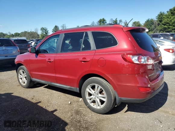 2012 Hyundai Santa Fe SE with VIN 5XYZHDAGXCG162350, listed as a Copart auction lot 70874435 with 163,084 mi miles and Salvage title. Bid and sale history available at DreamBid. Image 2.