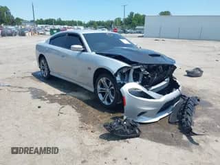 2021 Dodge Charger R/T with VIN 2C3CDXCT2MH587498, listed as a IAAI auction lot 42384717 with 63,039 mi miles and . Bid and sale history available at DreamBid. Image 1.