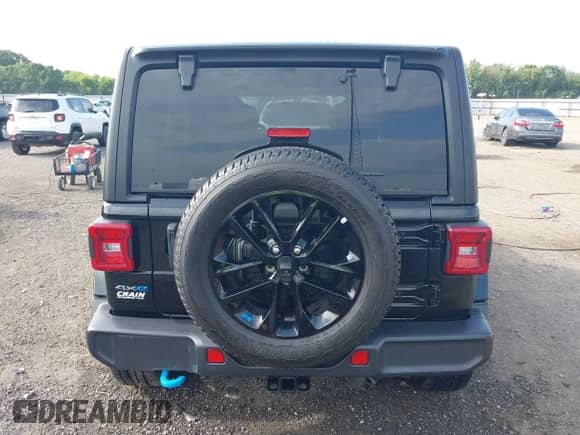 2023 Jeep Wrangler Sahara with VIN 1C4JJXP62PW628735, listed as a IAAI auction lot 42683940 with 46,534 mi miles and . Bid and sale history available at DreamBid. Image 16.