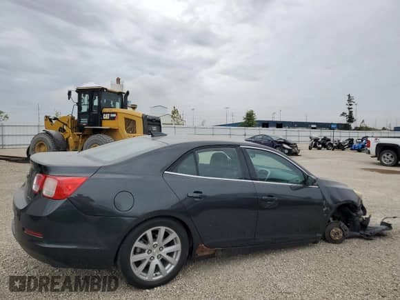 2015 Chevrolet Malibu LT with VIN 1G11D5SL0FF174596, listed as a Copart auction lot 85305895 with 217,309 mi miles and Salvage title. Bid and sale history available at DreamBid. Image 3.